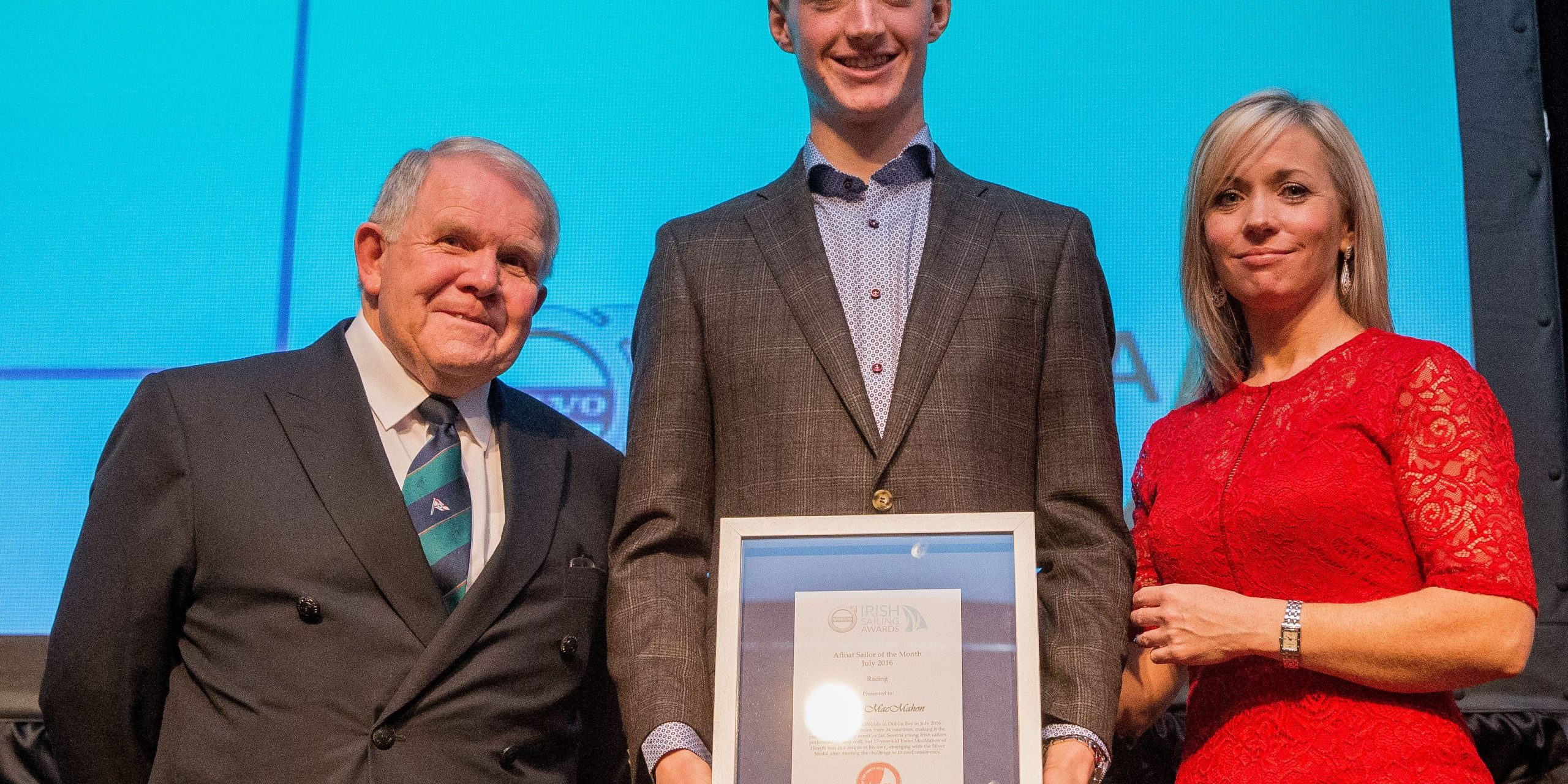 Ewan MacMahon is presented with his award by Patricia Greene and David Lovegrove 27/1/2017